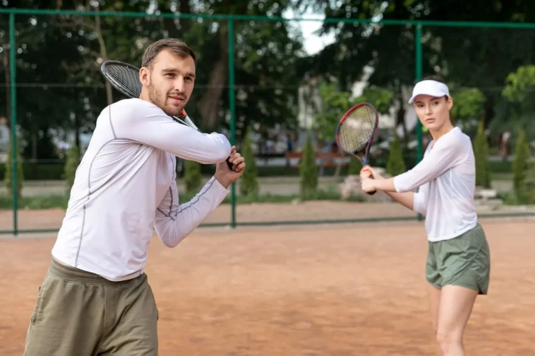 convertio.in_front-view-couple-playing-tennis (1) (1) (1)
